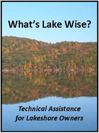 view of lake with hills of autumn foliage in background - link to 'What's Lake Wise - technical assistance for lakeshore owners'