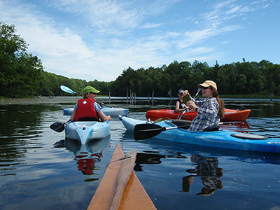 A trio of kayakers