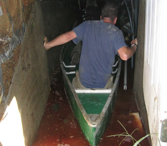 Entering a bulkhead on a fuel oil slick.  Waterbury 2011. Photo by Steve Lotspeich.