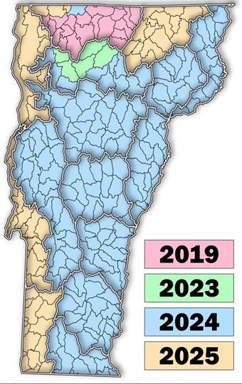 A map of Vermont with watersheds outlines and highlighted in four different colors to show when National Wetland Inventory updates are expected to be completed by.