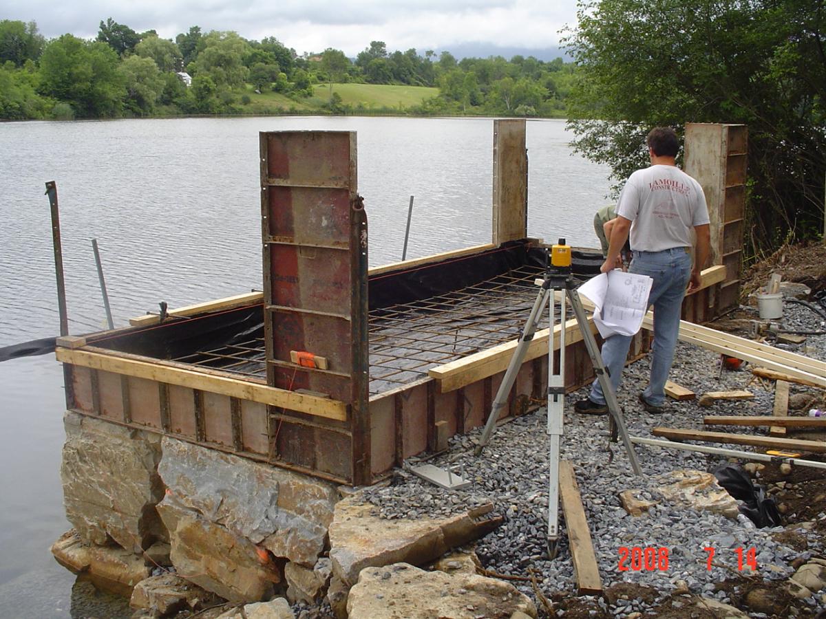 Concrete forms and rebar of a fishing platform