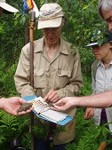 people sampling soils