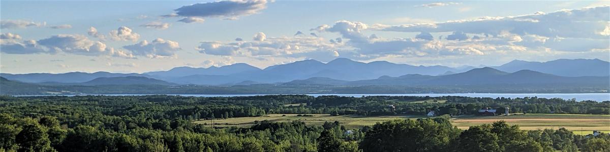 View of Adirondack Mountains over Lake Champlain from Vermont