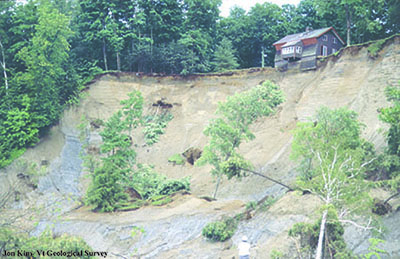 house perched at top of bluff