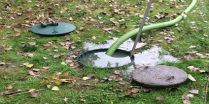 A hose siphoning out liquid