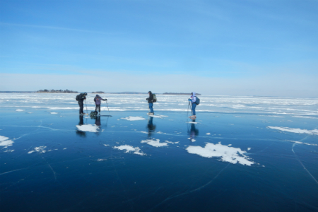 Photo of people Nordic skating on Lake Champlain in winter
