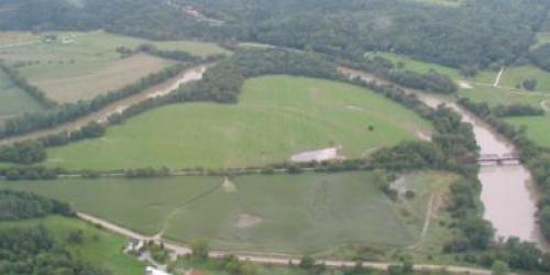Aerial view of river and surrounding fields