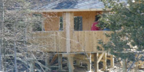 Building at Wenlock wildlife management area surrounded by trees