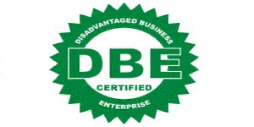 a green circular gear with a white center, DBE written across the center