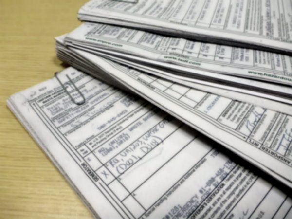 pile of manifest paperwork