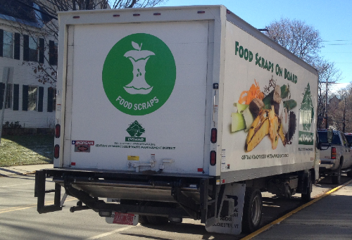 A photo of a truck that picks up food scraps and brings them to a compost facility.