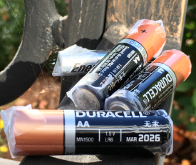 Photo of AA batteries with their ends taped for safe recycling
