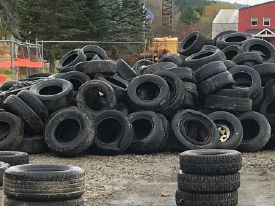 Photo of a large pile of used tires