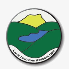 Lake Iroquois Association Logo, a drawing of the Camels Hump rising above lake Iroquois
