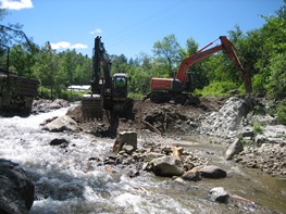 Heavy equipment working on Wells River dam removal