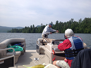 People out on Lake Champlain gathering water samples