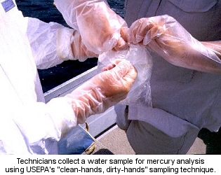 Technicians collect a water sample for mercury analysis