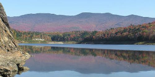 Lake, shoreline, and mountains